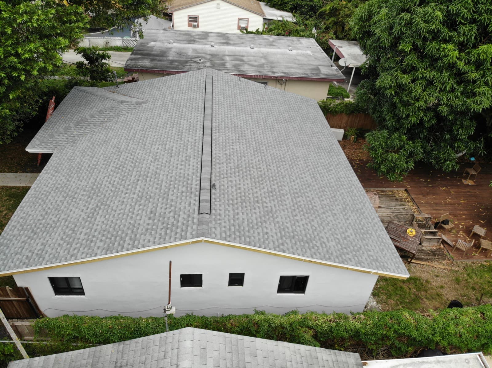 New architectural shingle roof installed by Flat Rate Roofing
