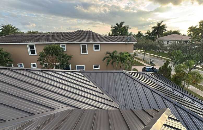 Aerial view of a completed metal roof